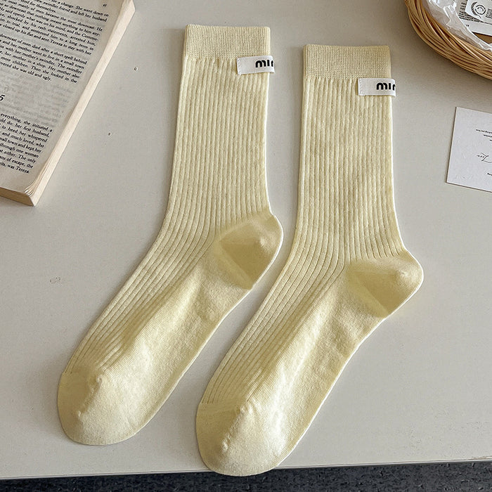 Wholesale Sock fabric label letter pile socks college style versatile colorful mid tube socks