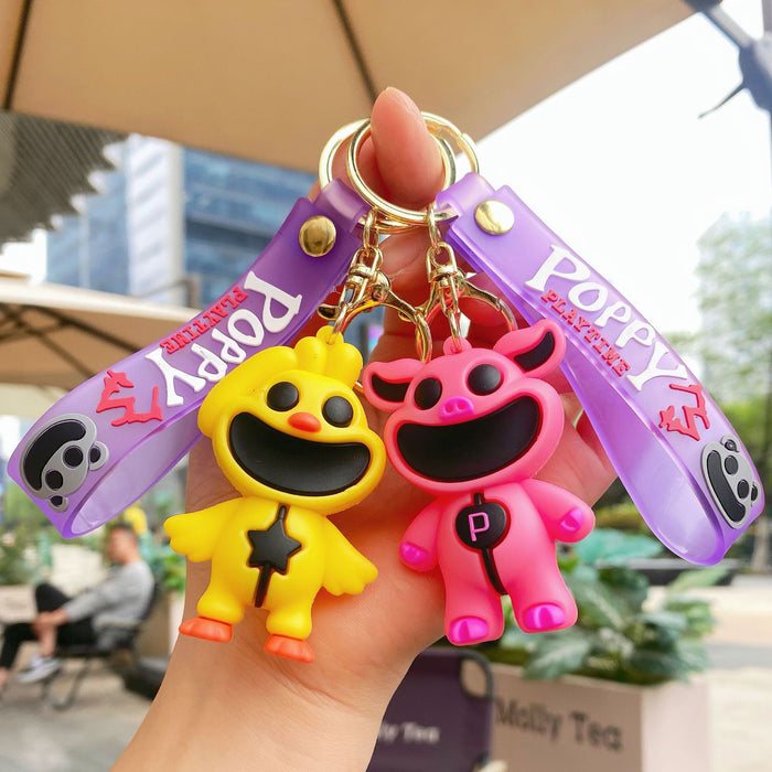 Wholesale Cute silicone smiling animal keychain
