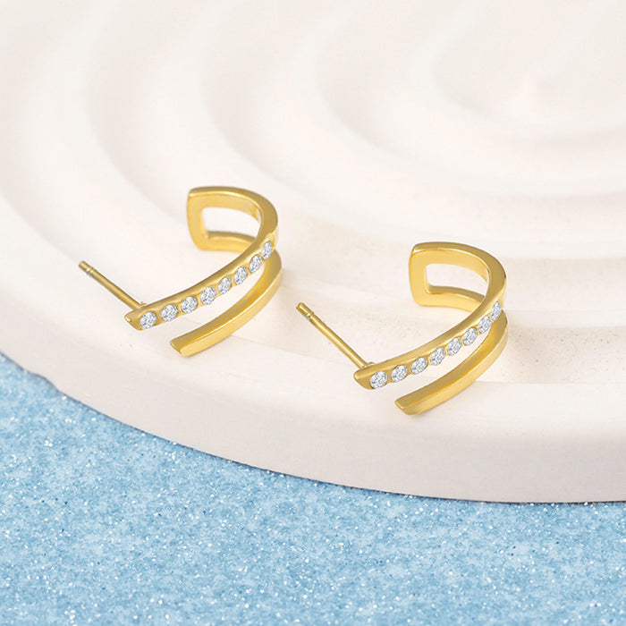 Wholesale Retro style hollow gold lines circular stainless steel earrings electroplated with diamond studded metal earrings