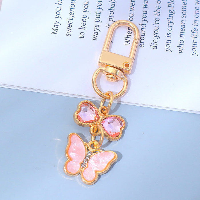 Wholesale Keychain Pendant Creative Alloy Butterfly Headphone Mobile Phone Bag Pendant