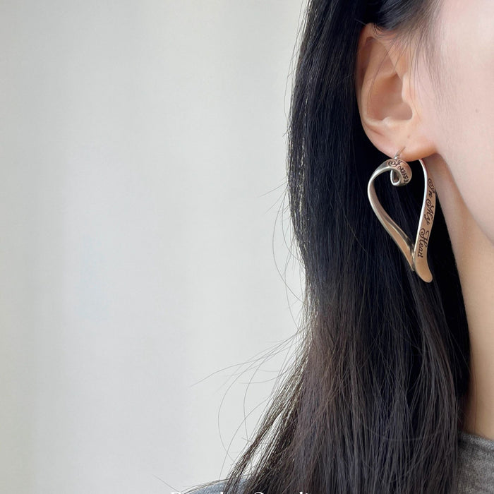 Wholesale Graffiti letter heart ear buckle niche design, high-end feeling, light luxury, retro earrings, earrings, new handmade accessories