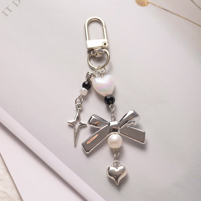 Wholesale Silver Bow Mobile Phone Chain Versatile Bag Pendant Polaroid Key Chain