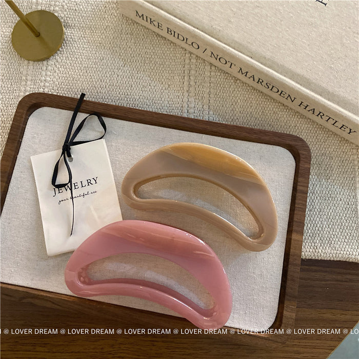 Wholesale Pink semi-circular hair clip with shark clip at the back of the head, versatile hair accessory