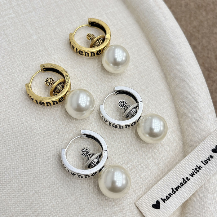 Wholesale medieval vintage distressed Saturn planet pearl ear buckle niche design earrings