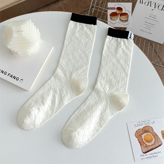 Wholesale Color blocked socks with hollowed out mesh and breathable lettering fabric label, colored midsole socks