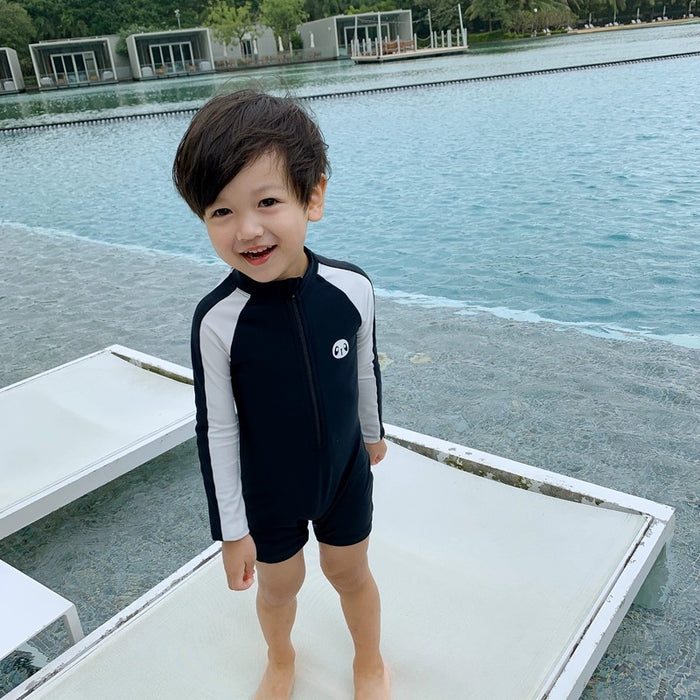 Wholesale Children's long sleeved sun protection quick drying one-piece hot spring swimsuit swimming