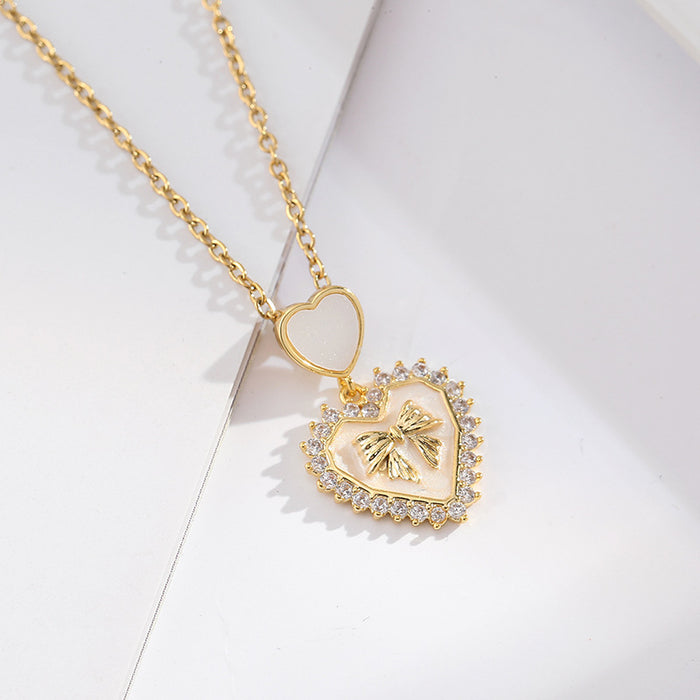 Wholesale Heart Bow Pendant Gold Steel Titanium Necklace JDC-NE-Minuo002