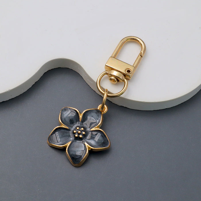 Wholesale Simple Dropping Oil Cherry Blossom Pendant Keychain Alloy Daisy Flower