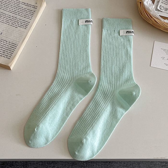 Wholesale Sock fabric label letter pile socks college style versatile colorful mid tube socks