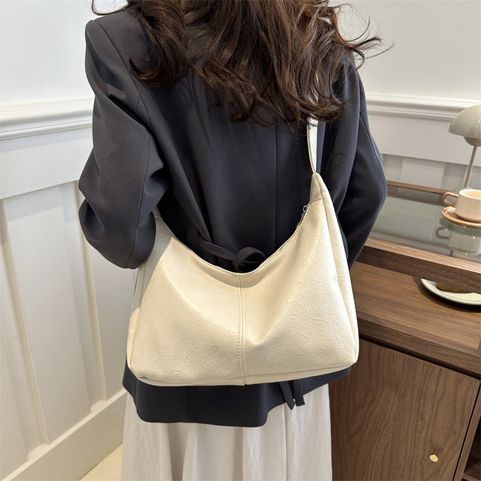 Wholesale Personalized retro tote bag for commuting, fashionable crossbody, simple shoulder bag