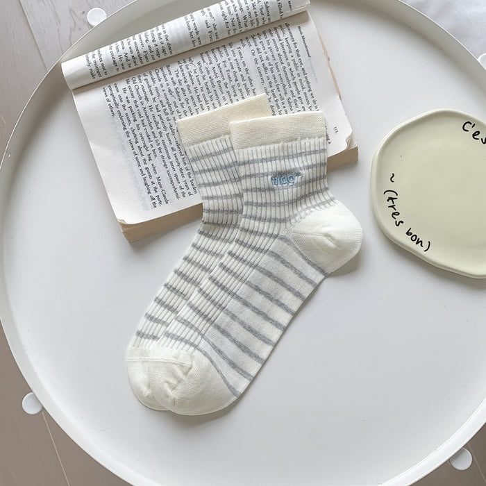 Wholesale Ultra transparent fine striped embroidered versatile mid length socks