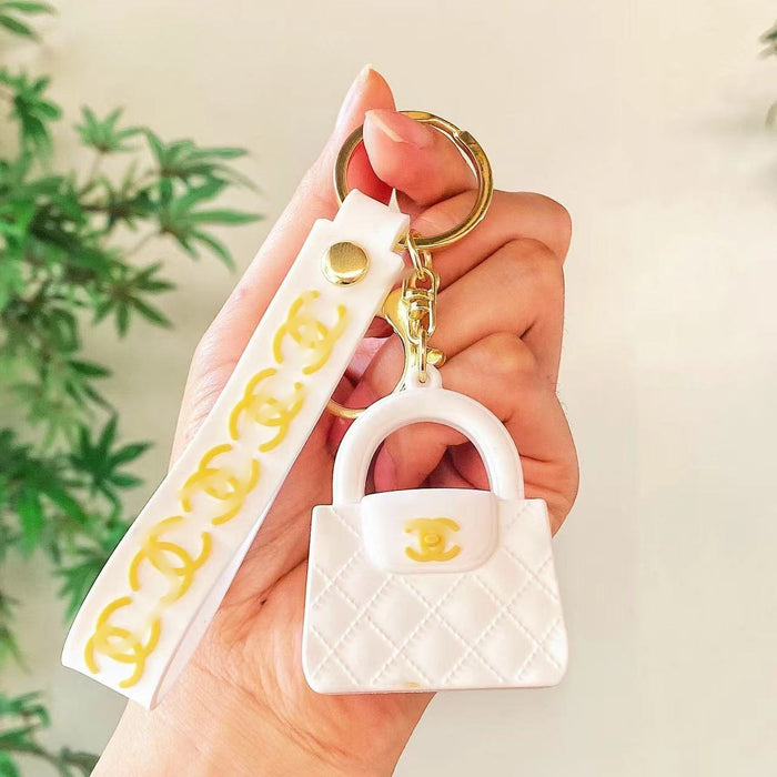 Wholesale Cartoon keychain silicone mini bag pendant car keychain fashion gift