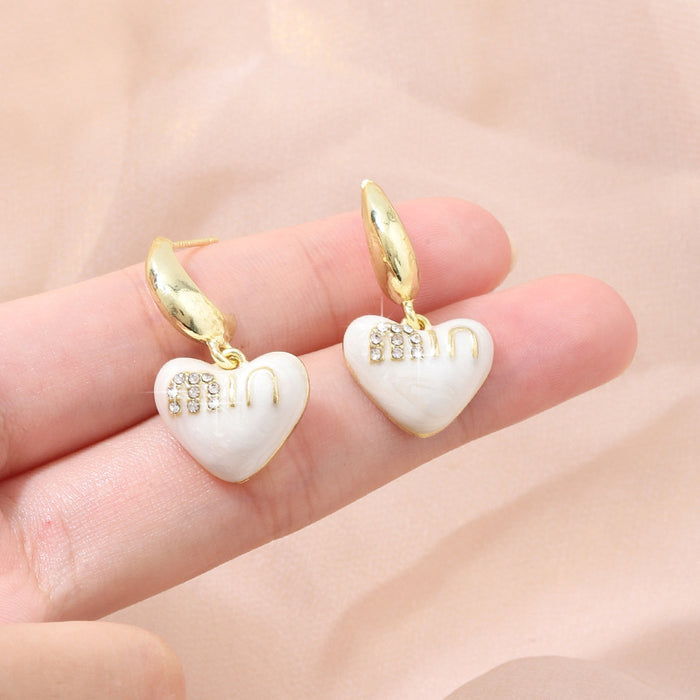 Wholesale Love earrings, niche design, light luxury, high-end, silver needle earrings, temperament