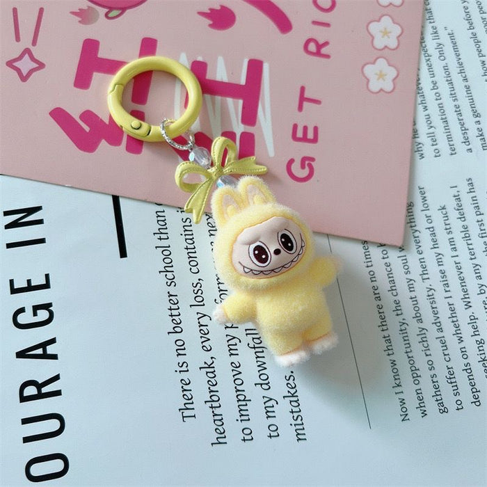 Wholesale 10pcs Cartoon cute bow little monster keychain plush doll pendant student bag hanging ornament gift