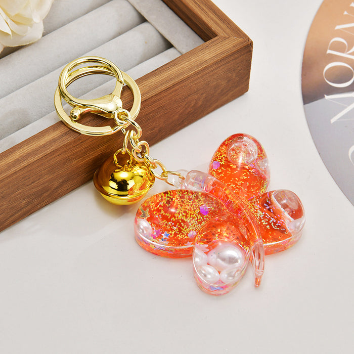 Wholesale Acrylic oil-filled glitter butterfly keychain