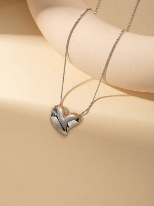 Wholesale Stainless Steel Clavicle Chain Necklace — Asymmetrical Design featuring a Bowknot  Rhinestone Accents  and Heart Pendant