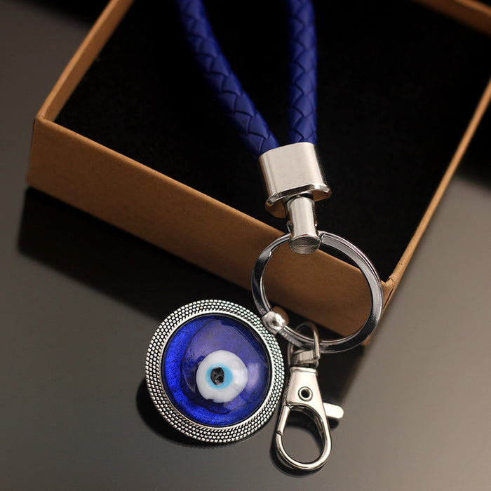 Wholesale Blue eyed blank metal keychain and chain gift keychain, fashionable and versatile