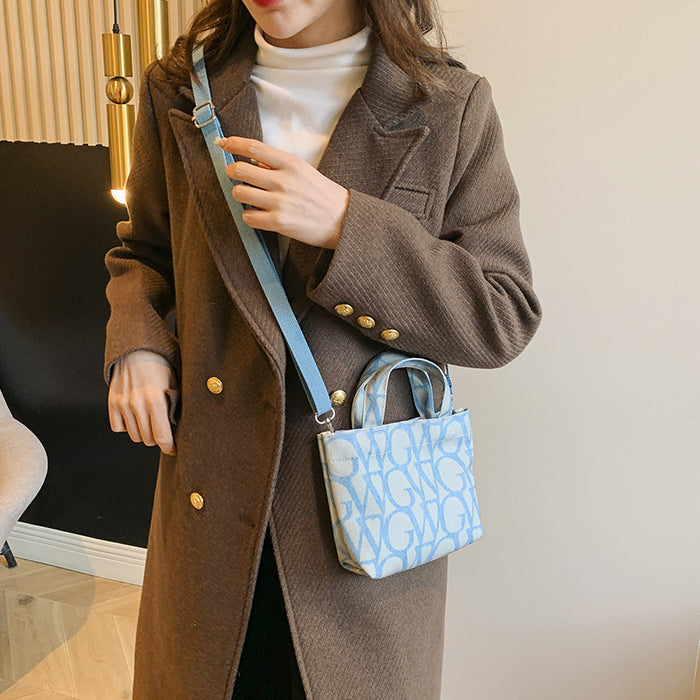 Wholesale Canvas letter printing portable small square bag trendy shoulder messenger bag