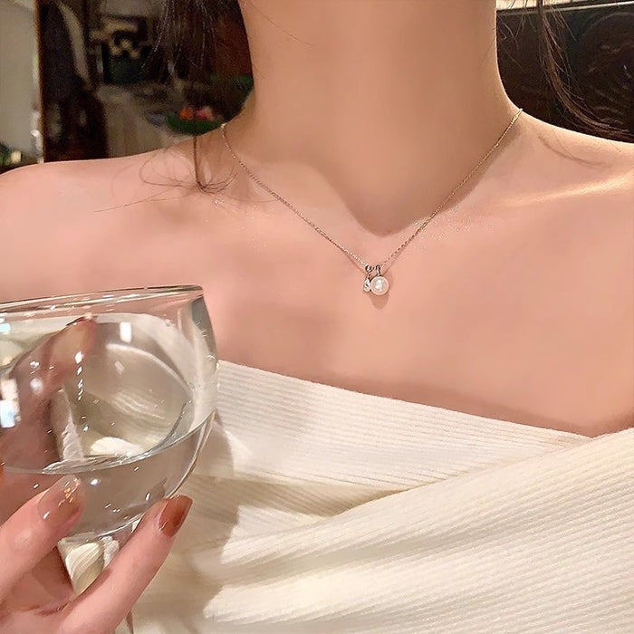 Wholesale Pearl necklace, women's pull-out collarbone chain, high-end, light luxury, niche necklace, sweater chain