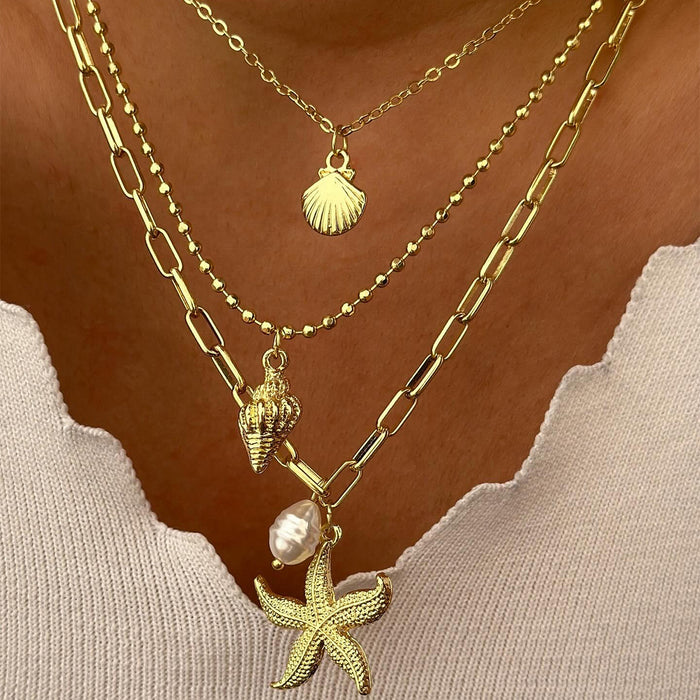 Wholesale Fashionable multi-layer layered metal starfish pendant necklace with conch shell necklace
