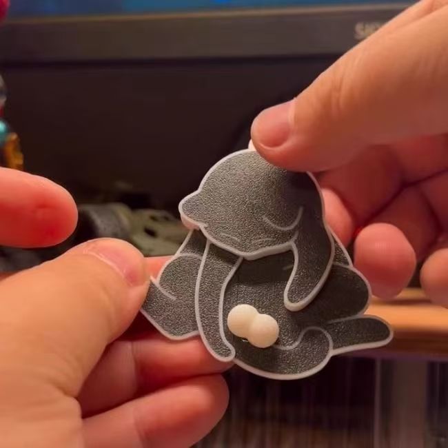 Wholesale Creative and quirky drawstring toy egg cat keychain pendant cute abstract rotatable bag pendant backpack accessories