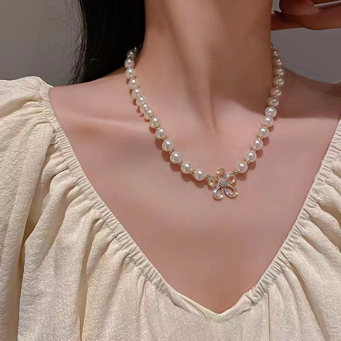 Wholesale  Double C Pearl Bow Female Shell Pearl Necklace-JDC-NE-Dingy007