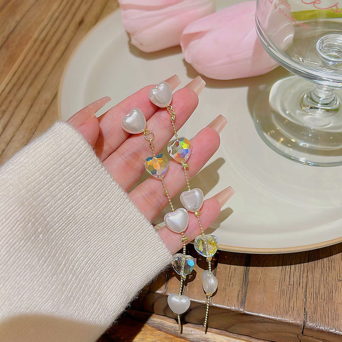 Wholesale Fashionable pearl earrings, high-end and versatile earrings, new niche style, long tassel earrings