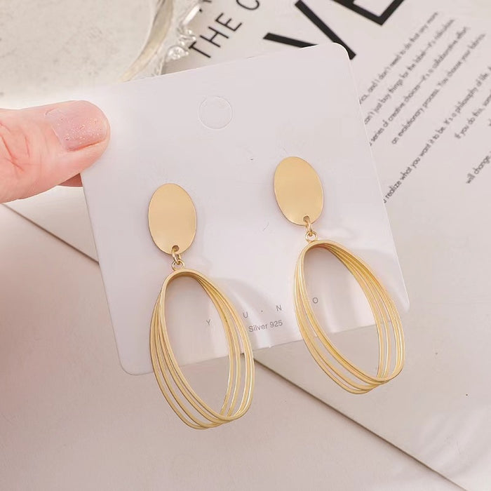 Wholesale Silver needle earrings with high-end feel, long geometric oval earrings, matte matte matte matte, fashionable earrings, trendy