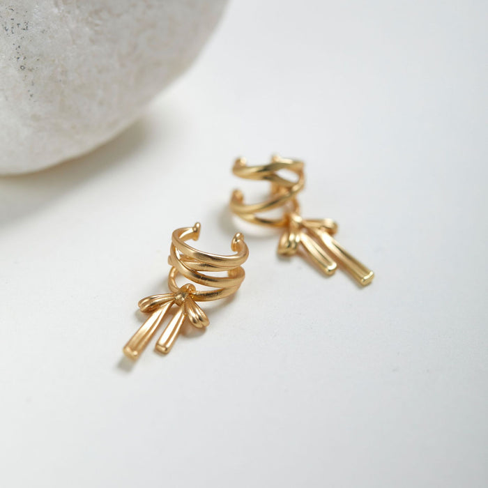 Wholesale Ballet bow ear bone clip niche design matte metal personality simple and versatile temperament earrings without ear holes