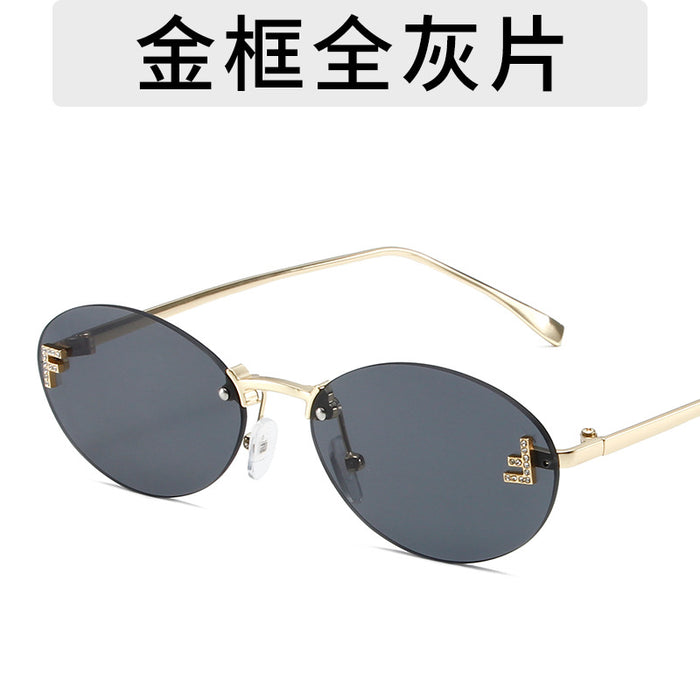Wholesale Elliptical frame small frame sunglasses, new frameless cut edge personalized glasses, dot diamond sunglasses