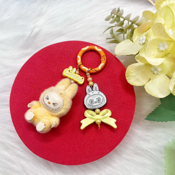 Wholesale Flocking mini keychain baby-free vinyl cute grain mobile phone pendant trendy accessories