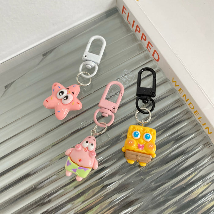 Wholesale Resin Couple Cartoon Handmade Keychain 2024 New Cute Sponge Doll Small Pendant Student Explosive Accessories