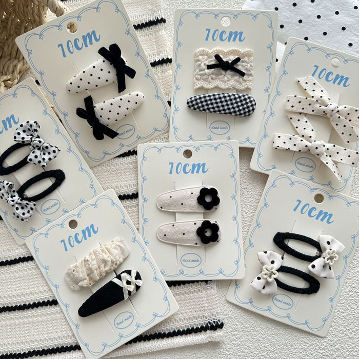 Wholesale Sweet bow hair clip with water droplets, wavy dots, children's fabric, side broken hair, wavy dots, bangs clip