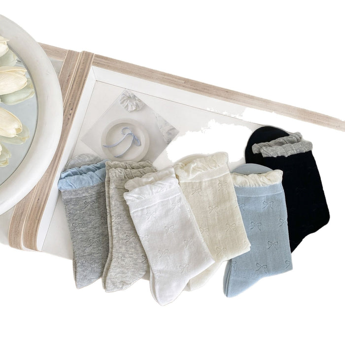 Wholesale Color blocked bow socks, boneless lace pile socks, mesh eyelets, tube socks