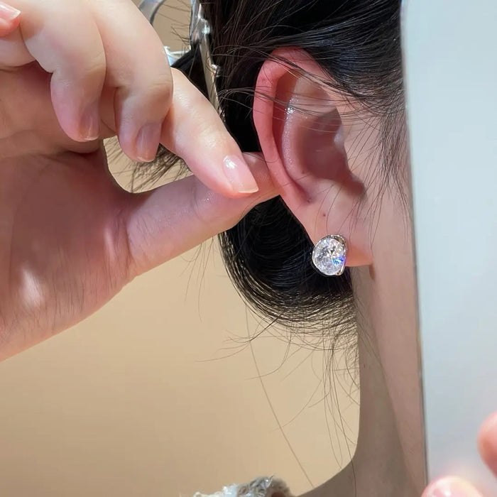 Wholesale Temperament earrings, irregular circle design, high-end texture