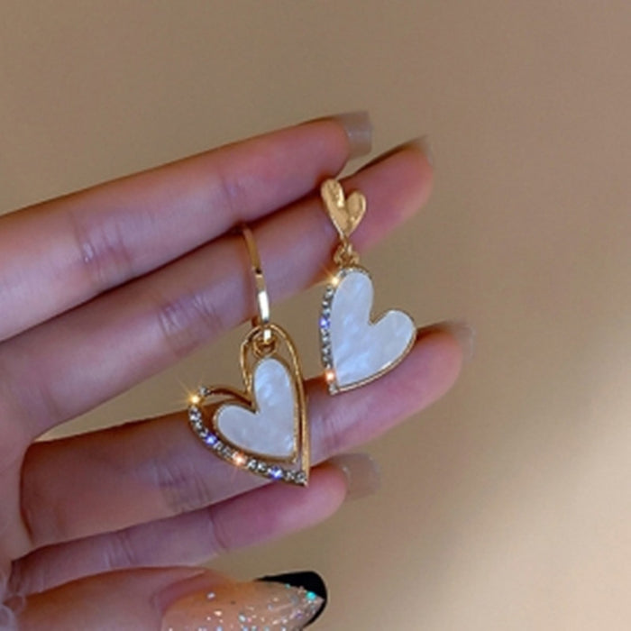 Wholesale Silver needle studded diamond asymmetrical heart-shaped earrings, light luxury and versatile earrings