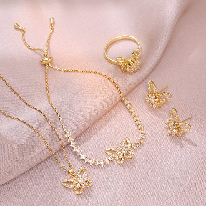 Wholesale Necklace Butterfly Three Piece Set Rotating Earrings Ring Necklace Micro Inlaid Zircon Clavicle Chain