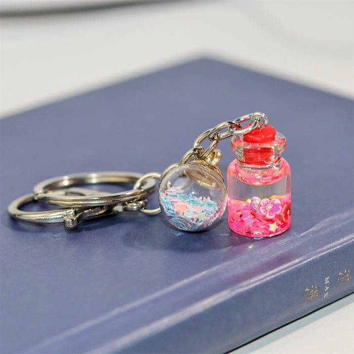 Wholesale Creative Keychain Girl Student Cute Flower Flowing Sand Bottle Key Pendant Bag Accessories Decorative Advertising Gift
