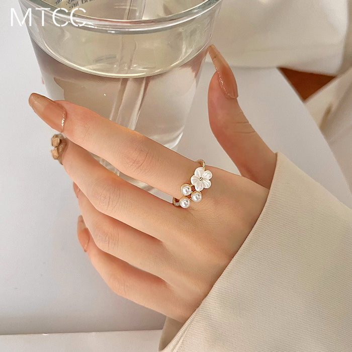 Wholesale Flower ring, female niche design, high-end temperament, pearl index finger ring, fashionable and personalized ring