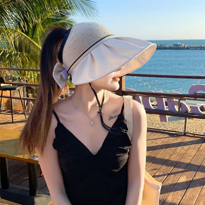 Wholesale New summer women's butterfly bow large eave hollow top hat UV resistant sun hat foldable outdoor hat