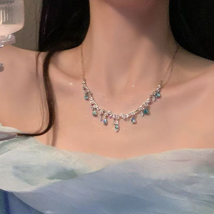 Wholesale Light luxury sparkling diamond water droplet fringe necklace, niche design, high-end temperament, versatile butterfly pendant, collarbone chain