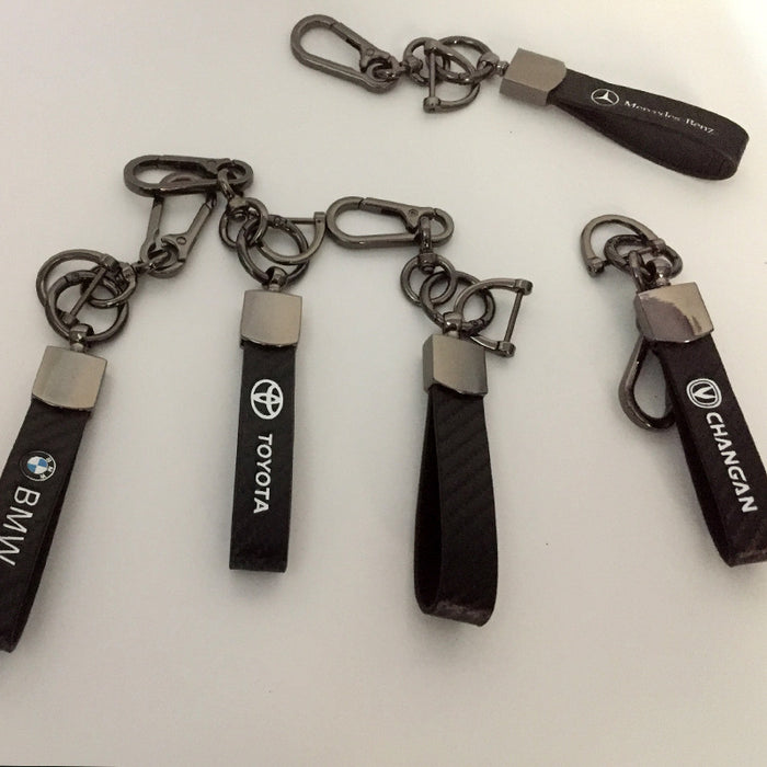 Wholesale Car keychain carbon fiber leather strap car keychain hanging rope