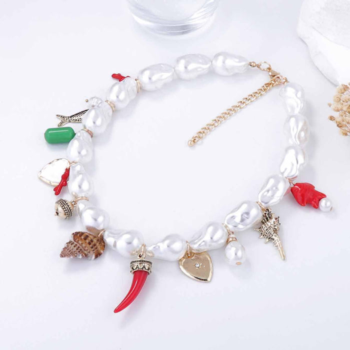 Wholesale imitation pearl alloy love ceramic small fish conch women's necklace