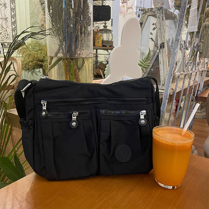 Wholesale Nylon fabric bag women' s urban simple messenger bag lightweight shoulder casual women' s bag