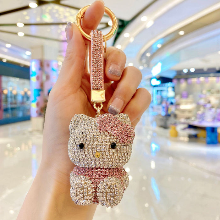 Wholesale diamond-encrusted cute doll car keychain fashion ladies bag pendant JDC-KC-ShuoT002