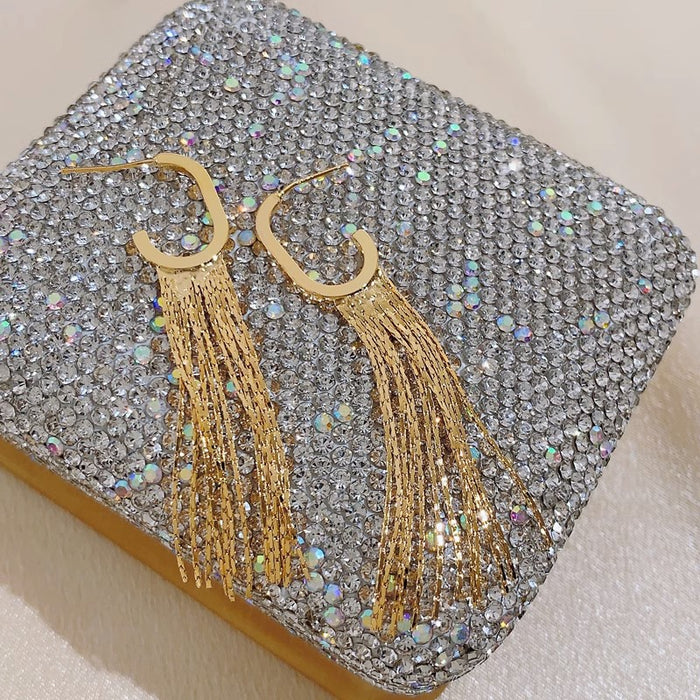 Wholesale Gold long tassel pick up Huan temperament big face suitable earrings niche design high-end all-match earrings