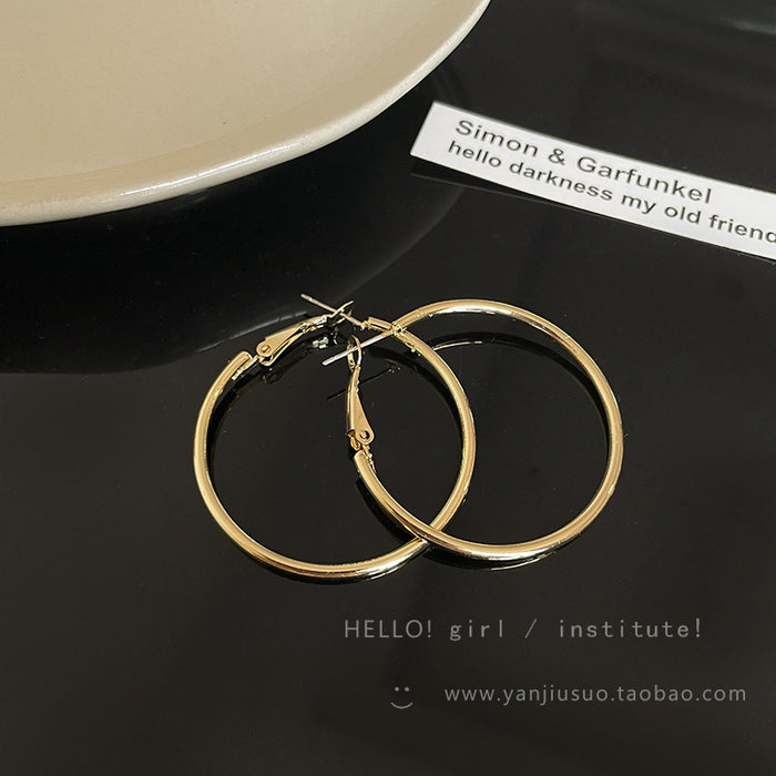 Wholesale Simple plain circle earrings, light luxury, niche earrings, high-end feel, unique temperament, ear rings
