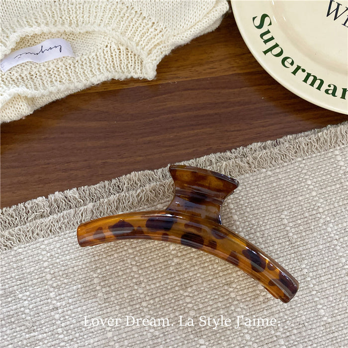 Wholesale Leopard print cross bow geometric hair clip, fashionable grip clip, versatile hair accessory