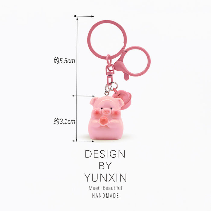 Wholesale Cute three-dimensional super cute bell pig keychain pendant backpack decoration pendant couple