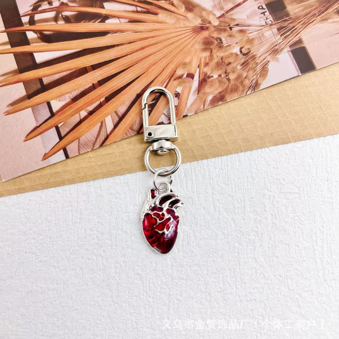 Wholesale Gothic style dark keychain pendant metal heart hot girl style palm bag cross pendant